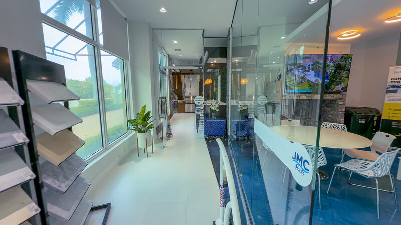 Showroom walkway lined with tile and paver sample displays